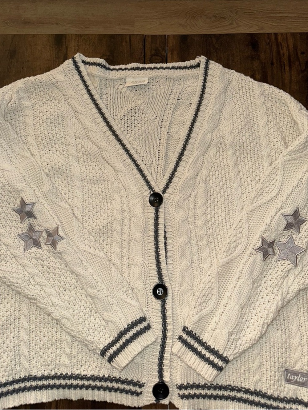 Taylor Cream Cable-Knit Cardigan with Star Patches and Contrast Trim